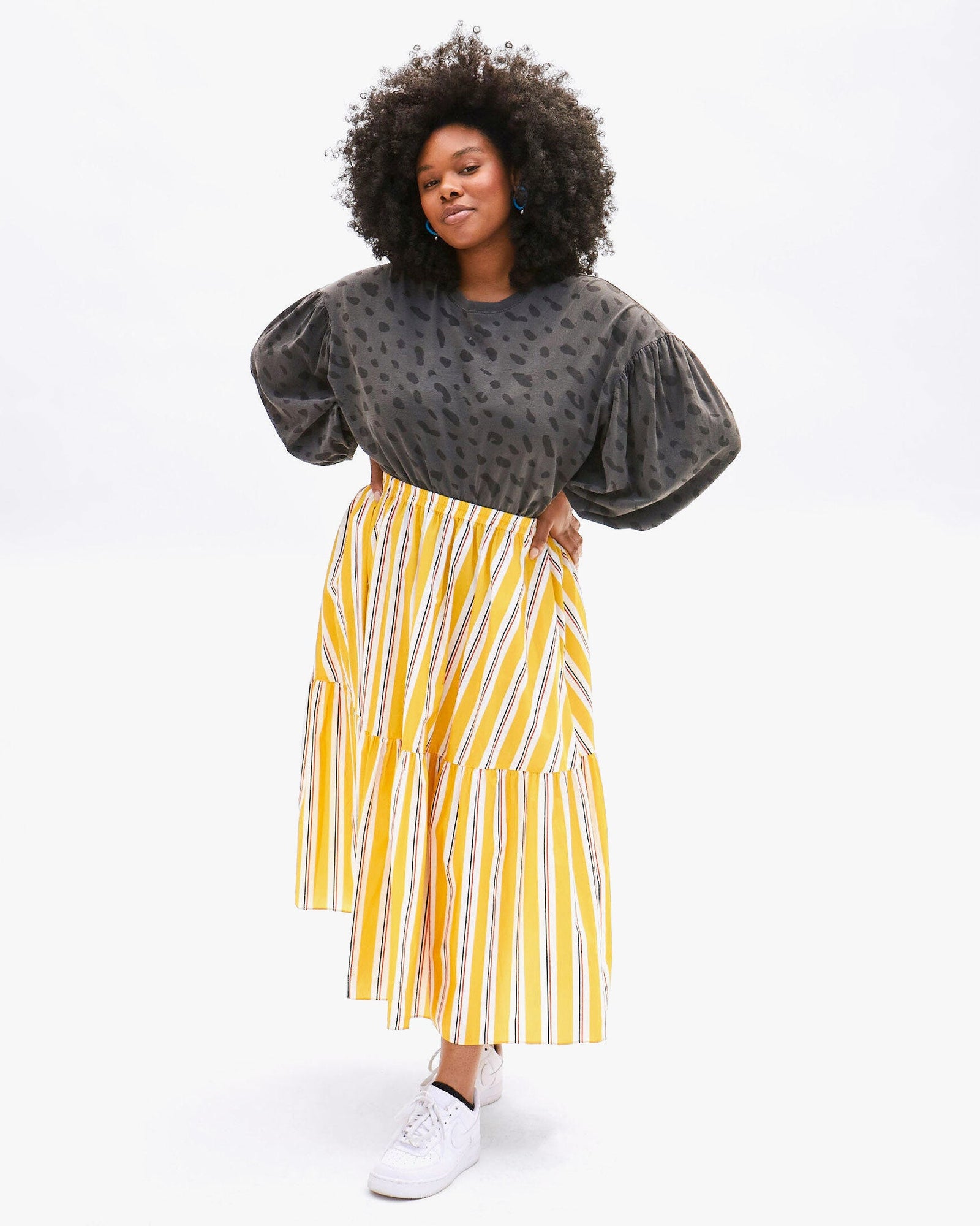 Candace wearing the Faded Black Jag Drop Shoulder Tee with the Marigold Multi Pinstripe Manon Skirt