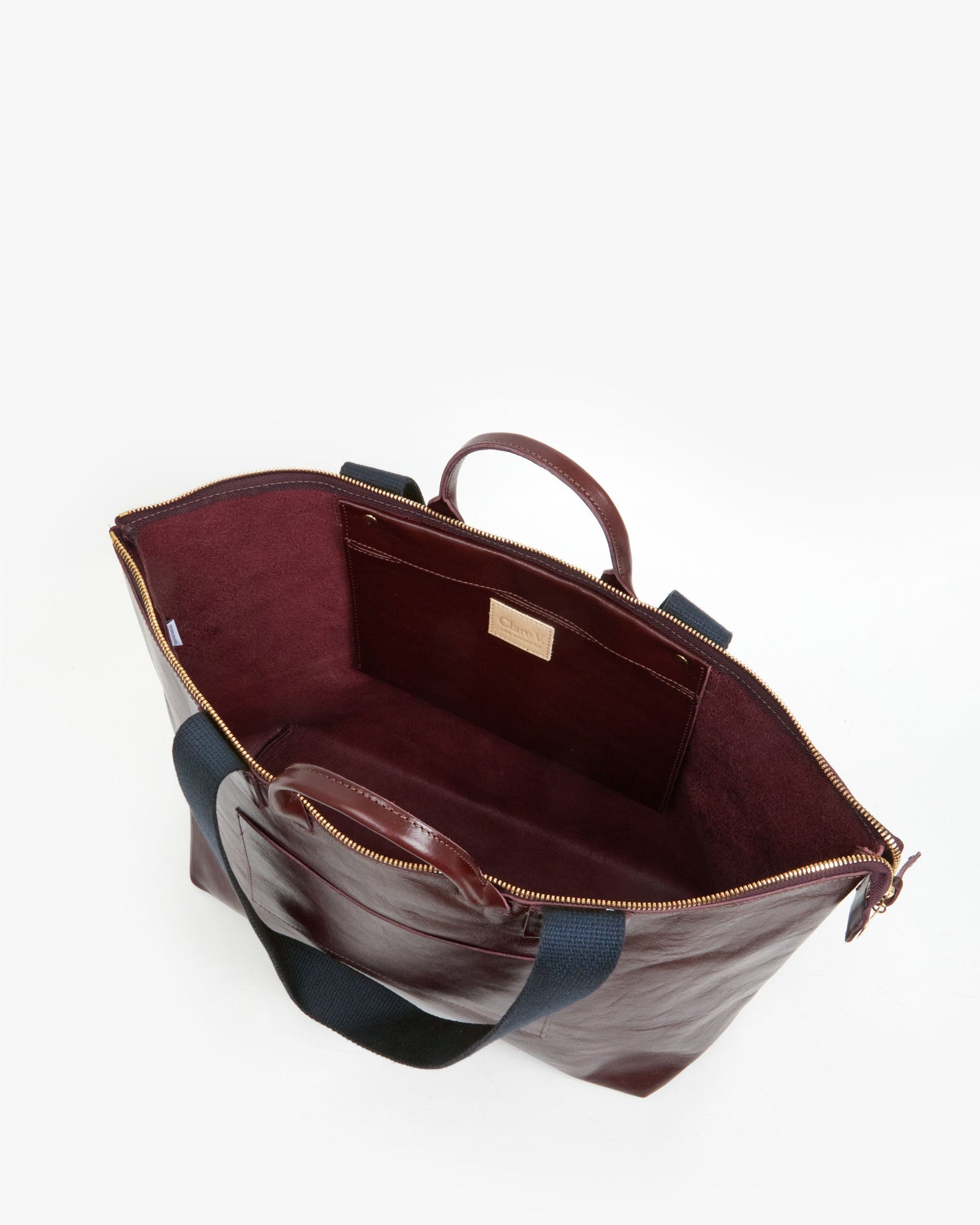 Interior flat of the Plum Le Zip Sac w/ Front Pocket