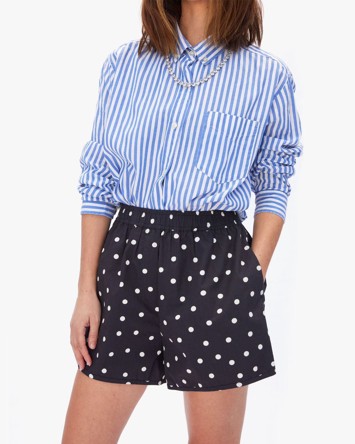 Frannie Wearing the Black and White Polka Dot St. Martin Shorts with a Blue & White Striped Button Down